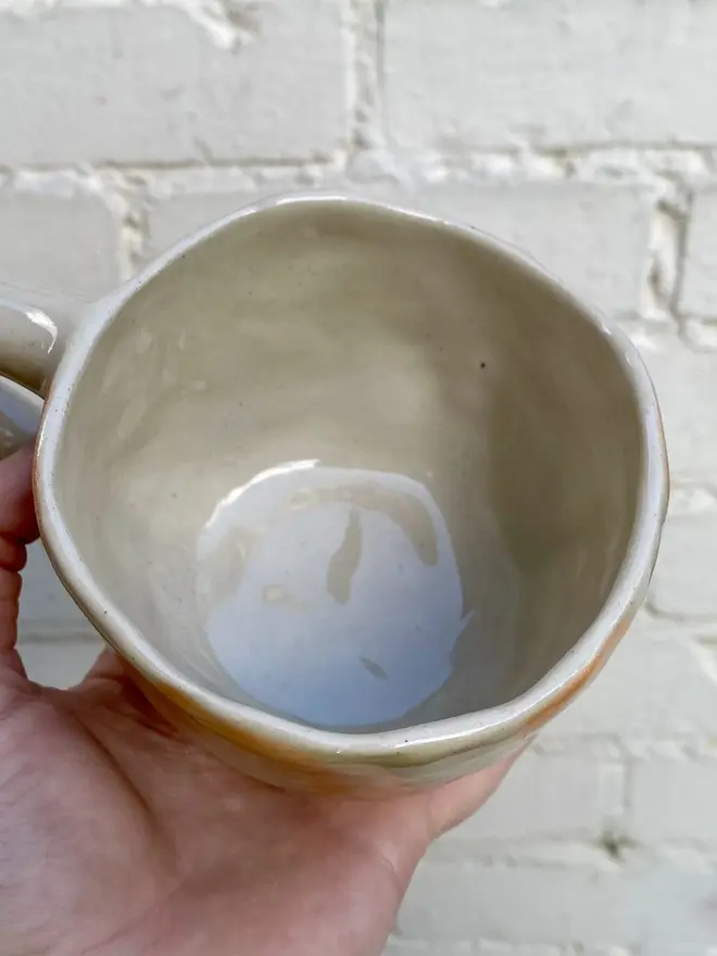 peachy checked handmade ceramic smiley face mug