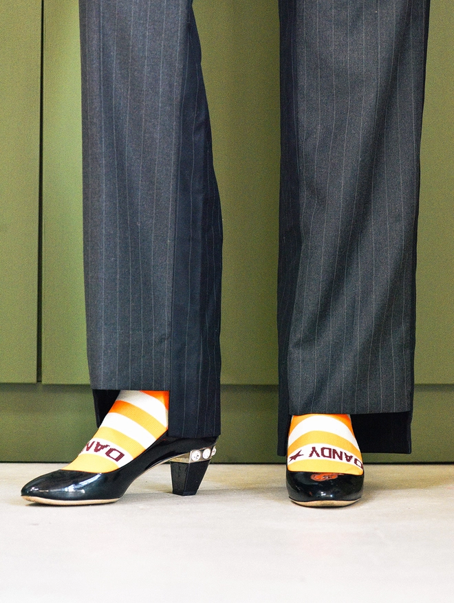 Orange neon breton stripe socks in miu miu pumps