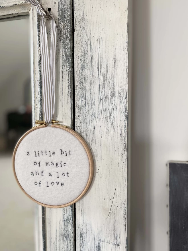 Custom Quote Embroidery Hoop Decoration hanging from a key