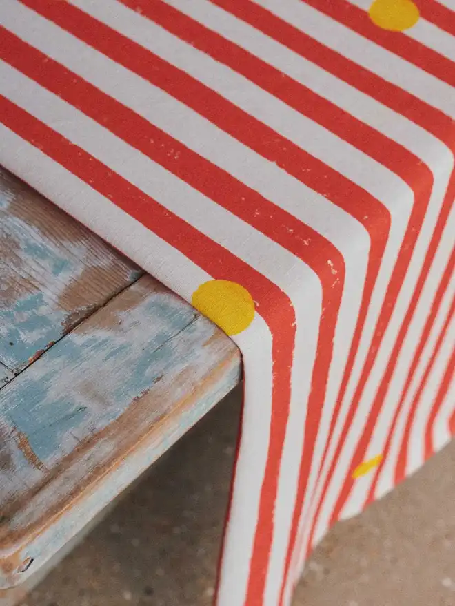 Red stripe yellow dot table runner