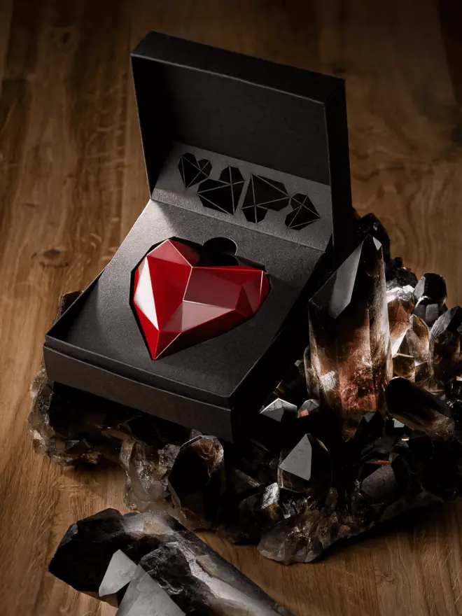 Red heart chocolate in a box - opened like a ring box