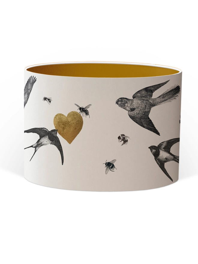 Drum Lampshade featuring birds and bees with a gold heart with a Gold inner on a white background