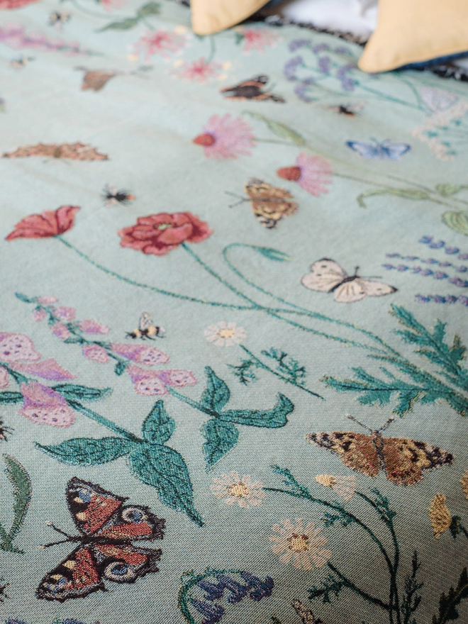 Details of the 'Pollination Meadow' Recycled Cotton Blanket by Arcana.