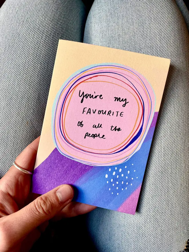 Nicola holds card which reads 'you're my favourite of all the people'