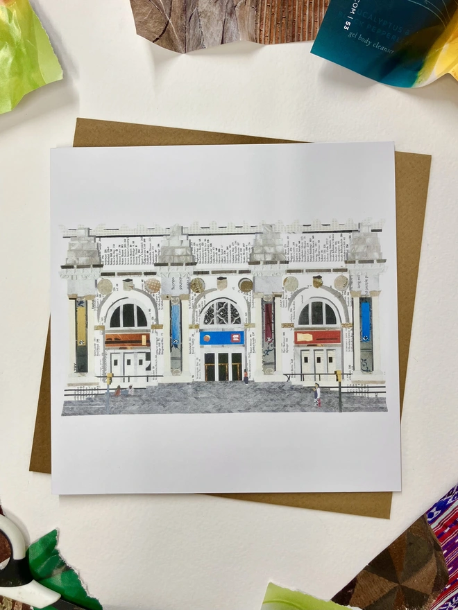 Greetings Card depicting a paper collage of The Met Museum in NYC on a white background with paper pieces around