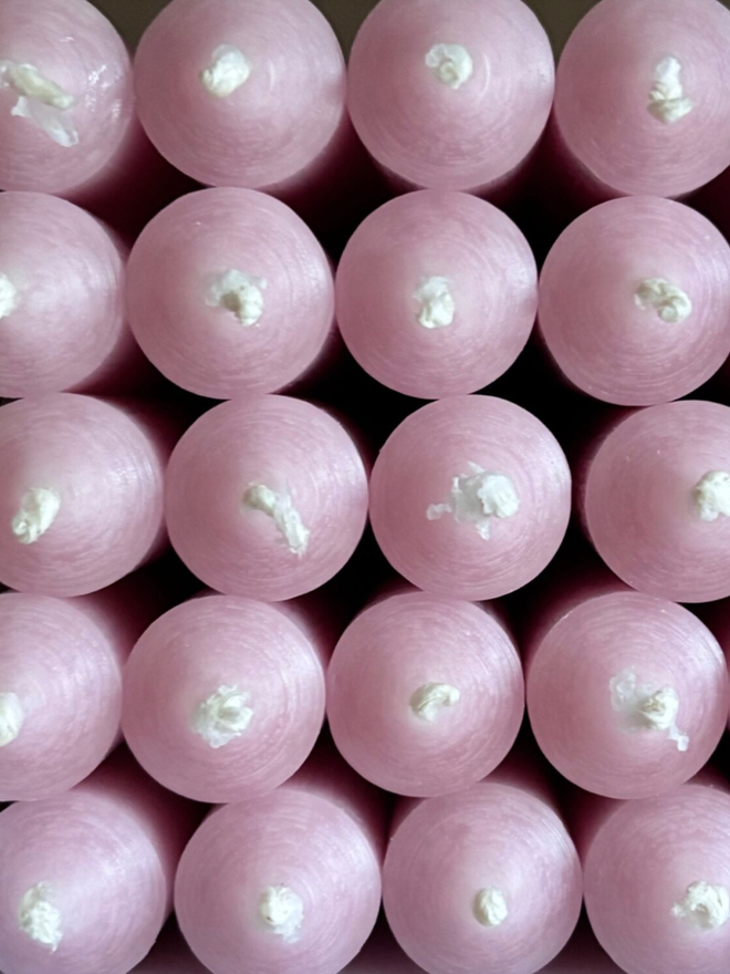 Boxed Candles. Candles in pink.