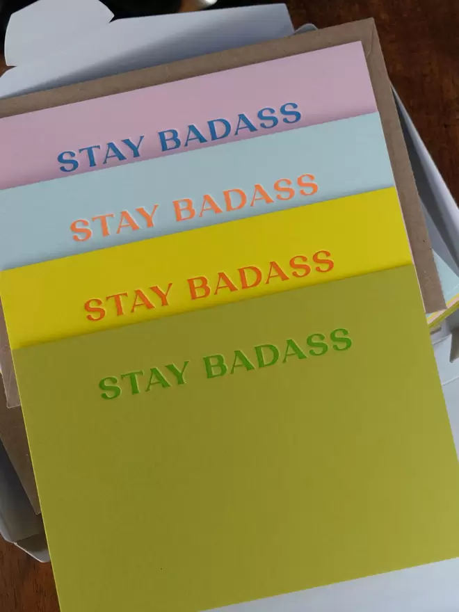 A set of colourful 'Stay Badass' notecards. 