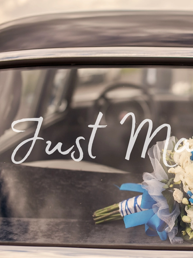 Wedding car decoration with Just Married sign
