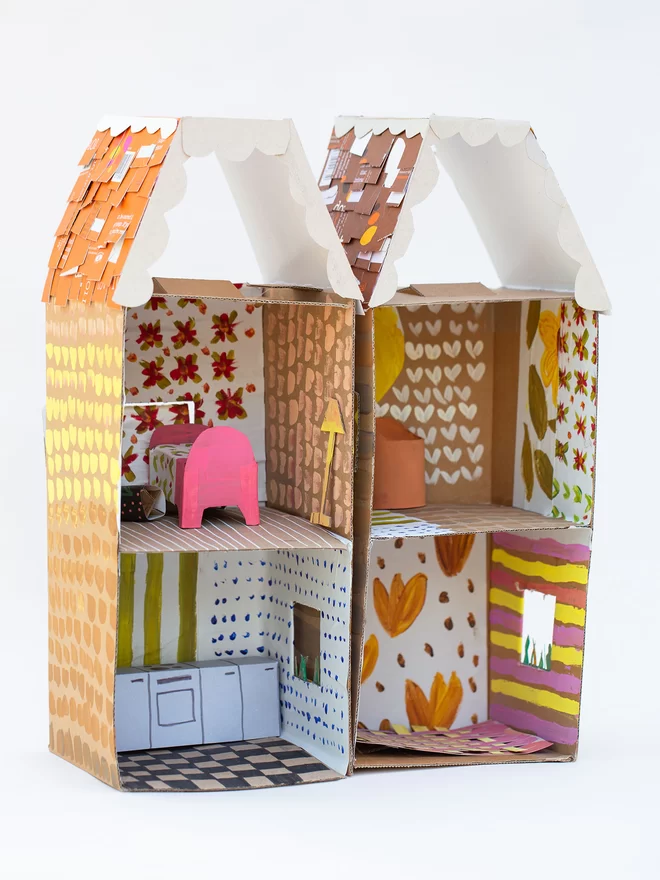 Home-Made House Craft Projects paint and decorate your home-made dolls house with decorated papers and paint
