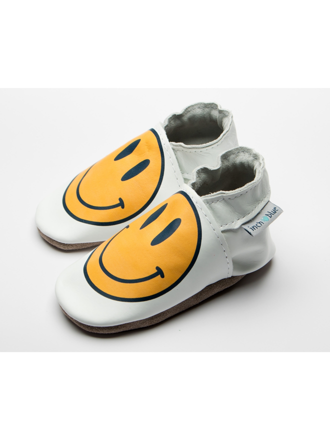 yellow smiley face baby shoes