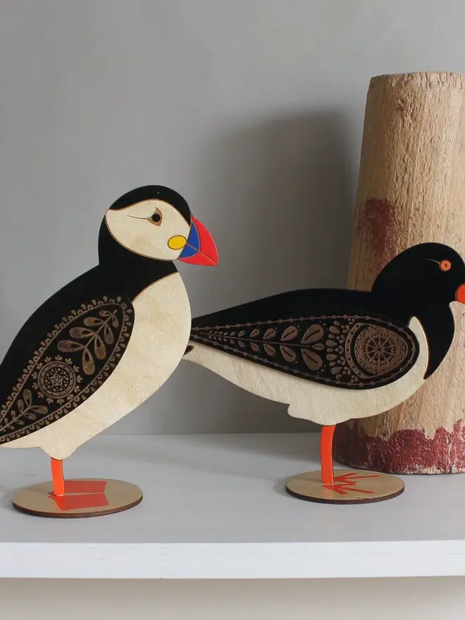 Standing Wooden Oyster Catcher, wooden bird decoration standing on a platform. 