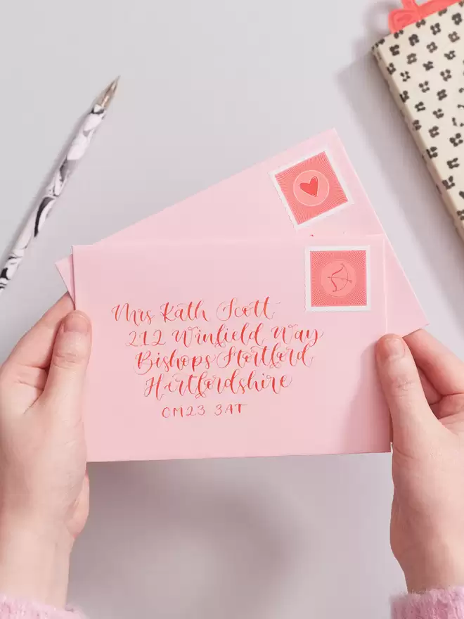 handwritten love letter pink and red calligraphy stamps 