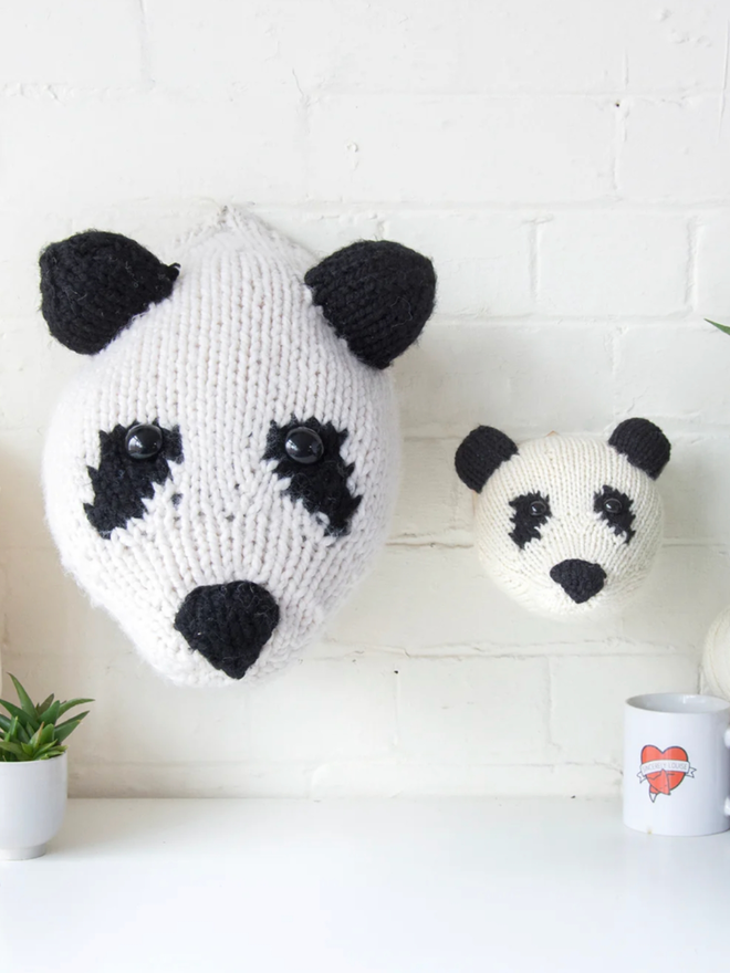 Bear Head Knit Kit. A giant panda bear head, completed and mounted.
