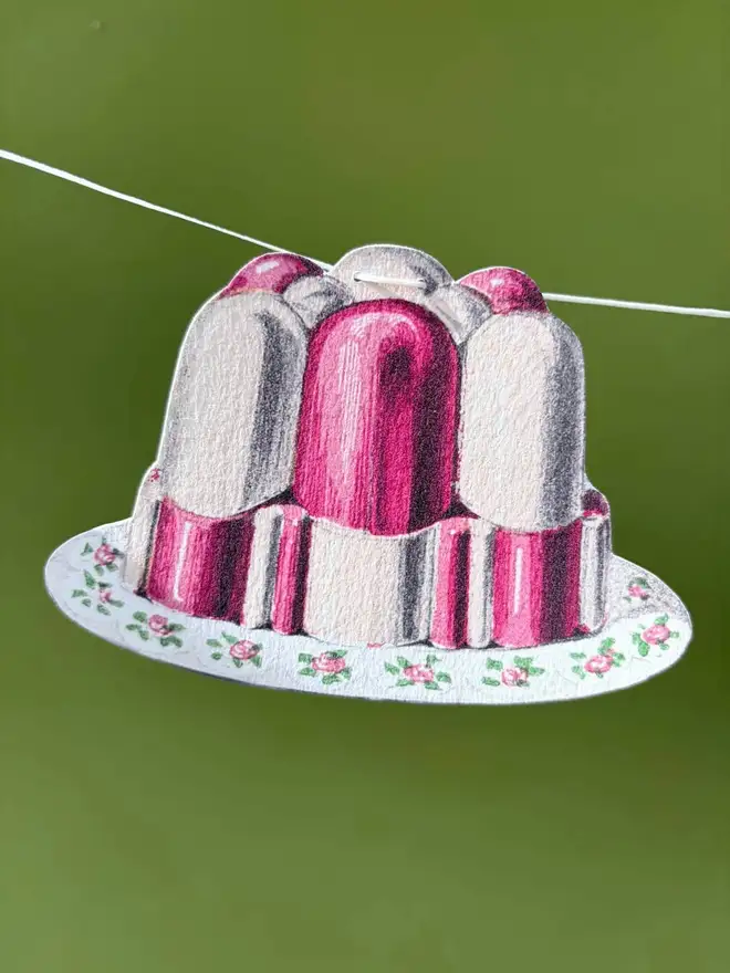 A pink and white jelly shaped pennant