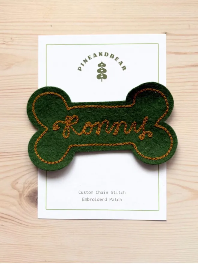 Personalised embroidered dog name patches in green