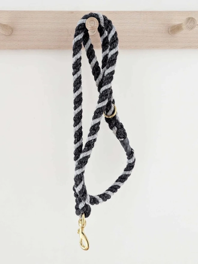 Wool Twist Dog Lead, a wool dog lead hanging on a wooden peg. 