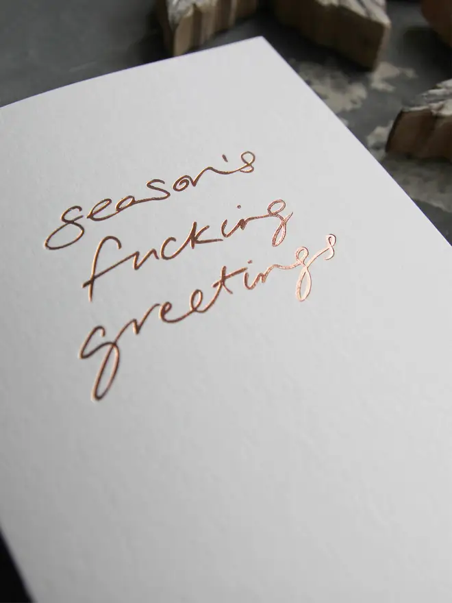 seasons greetings white christmas card metallic script