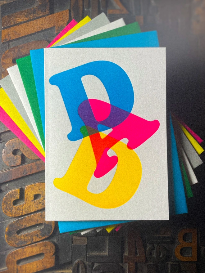 Fathers day typographic letterpress card with fluorescent ink. Deep impression print. Unique with no print being the same. Vibrant colours with matching premium envelopes. With luxurious contrasting coloured envelopes.