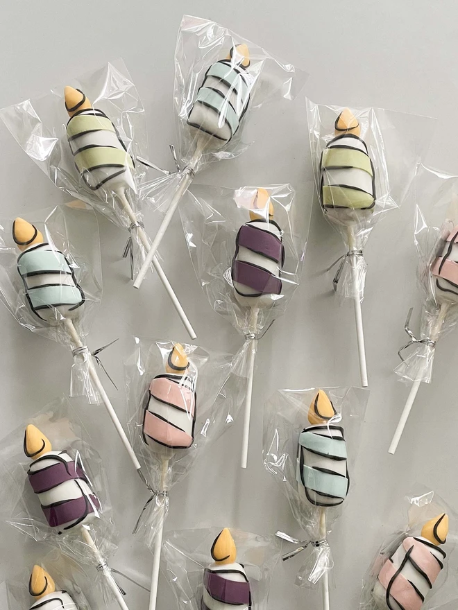 Cartoon Birthday Candle Cake Pops (Pack of 6, 12, 18, 24) individually wrapped, placed on a white backaground.