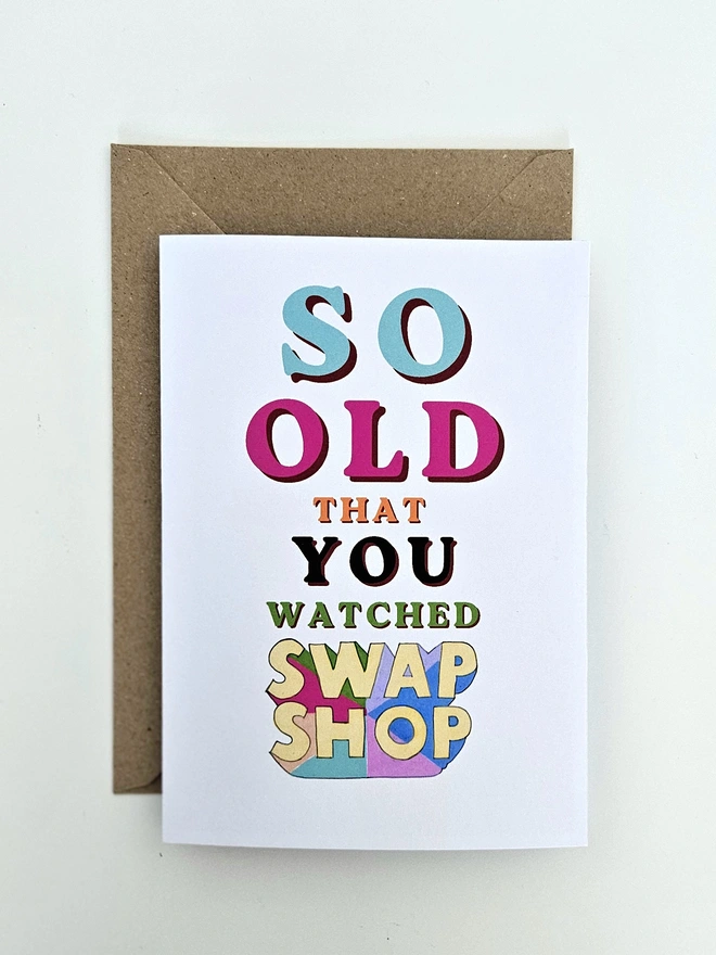 A nostalgic card that says So old that you watched Swap Shop in colourful retro style fonts on a white background.