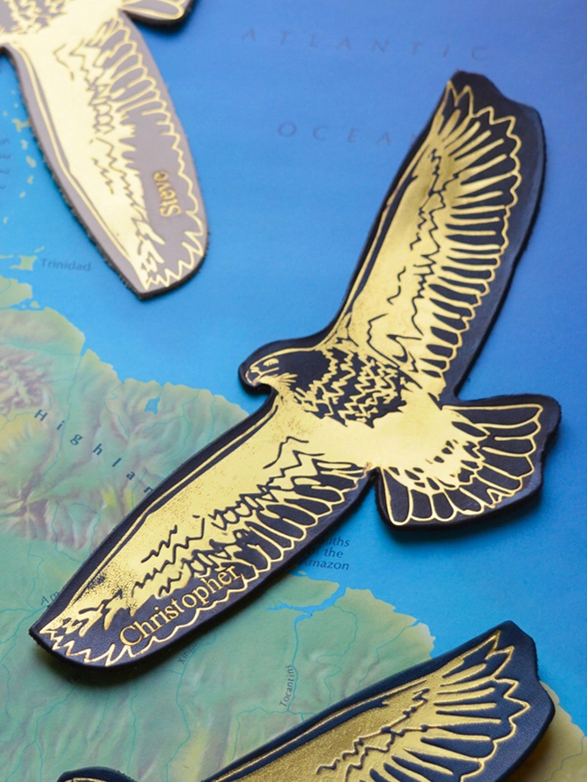 a brown leather eagle bookmark in gold foil embossing personalised by natthakur