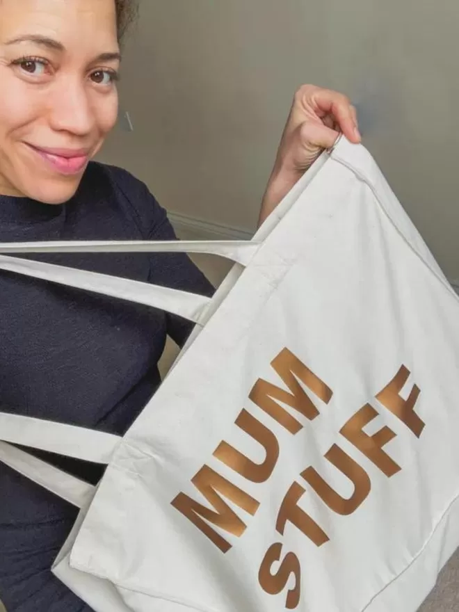 White mum stuff bag with gold lettering