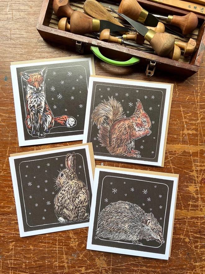 four art cards fox, red squirrel, hedgehog and rabbit snowflake design 