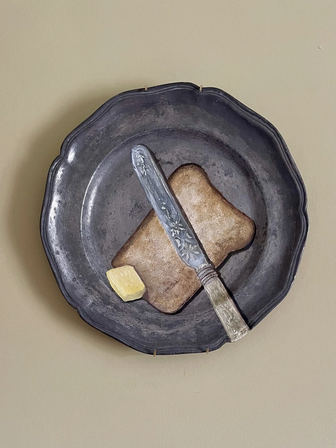 painting of bread and butter on pewter plate 
