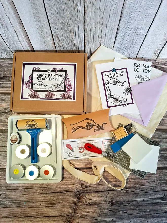 Fabric printing kit unpacked showing carving and inking tools