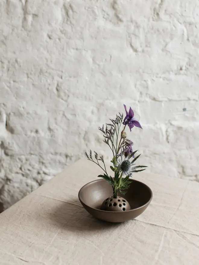 brown stoneware flower bowl