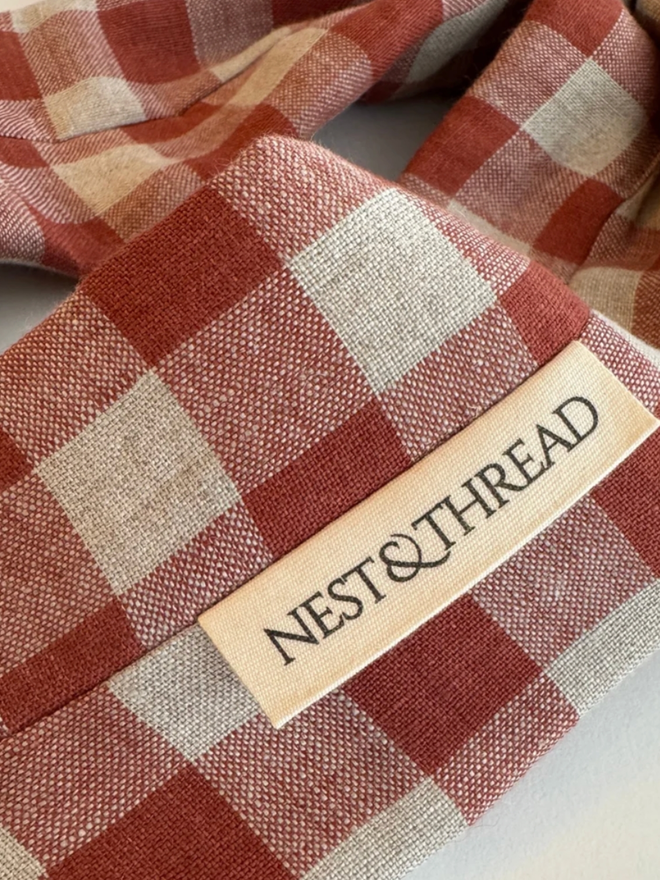 Rusty Gingham Bow. A close up of the bow’s design.