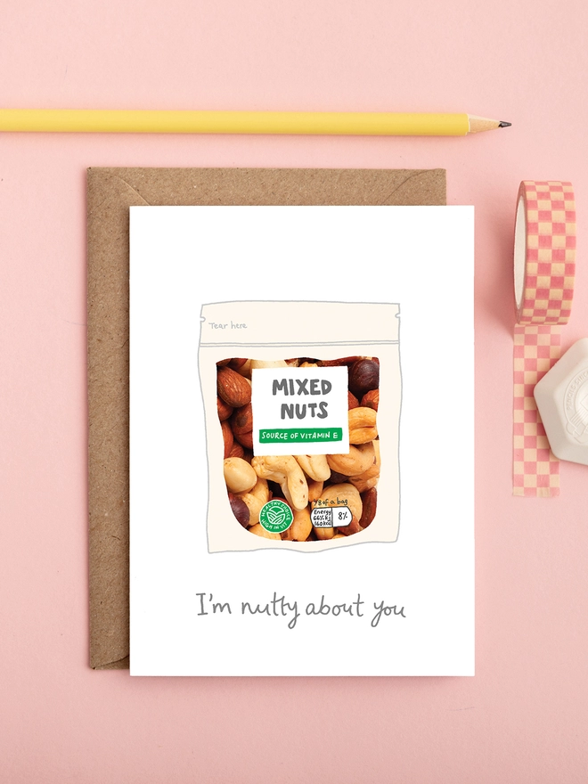 Funny love card featuring a bag of mixed nuts