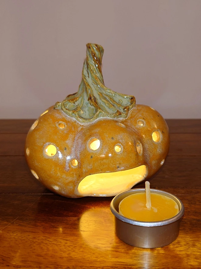 Pumpkin candle holder