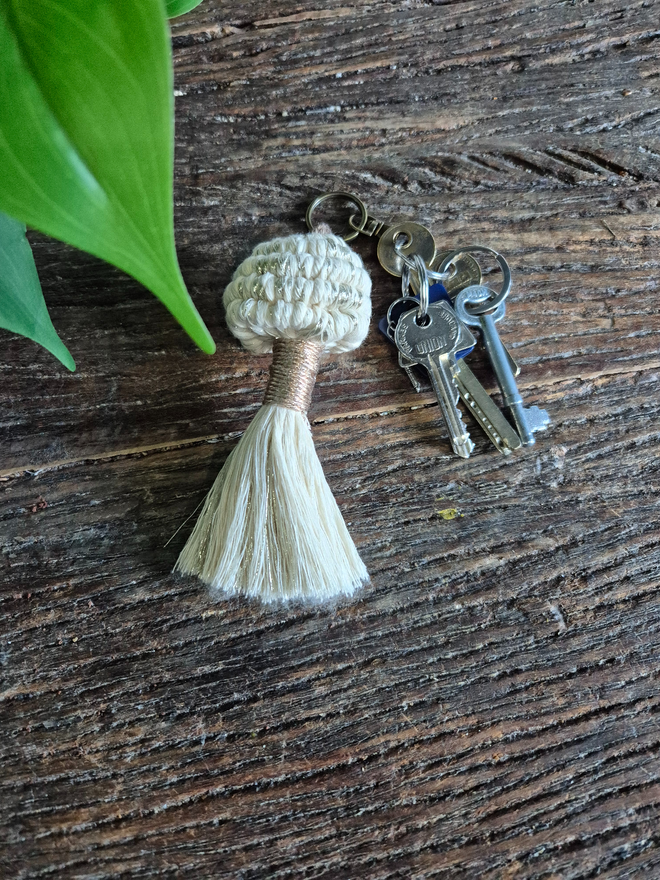 macrame mushroom inspired handmade keyring made using Eco-friendly materials, adding a playful and charming style to your keys, bags, keychains, Also makes great gifts such as stocking fillers, teachers gifts and stylish presents