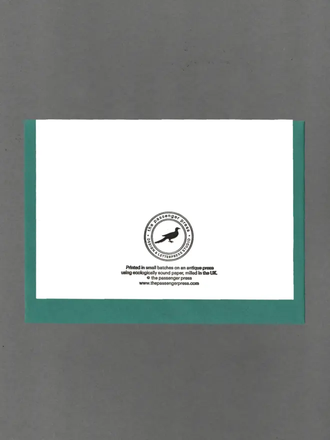 back of card with teal envelope enfolded