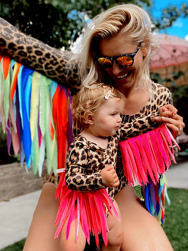 childrens and adults leopard printed leotard with gold galaxy dust. Long sleeves and Rainbow feather effect wings. Twinning.