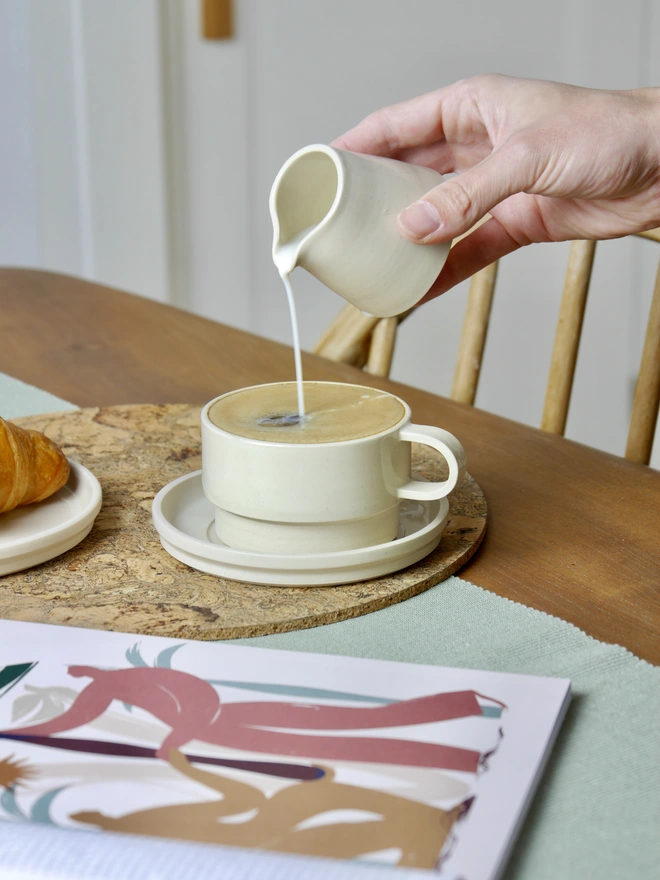 Ceramic Mug And Saucer Coffee Set in cream