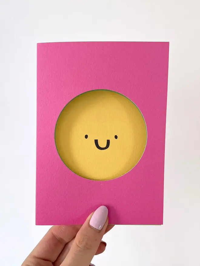 pink yellow smiley face cut out greeting card