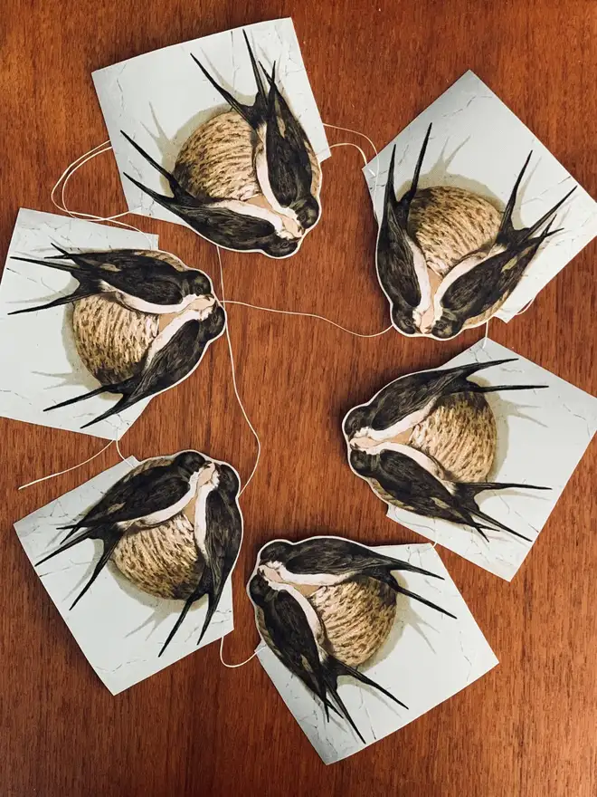 Swallows on a nest bunting