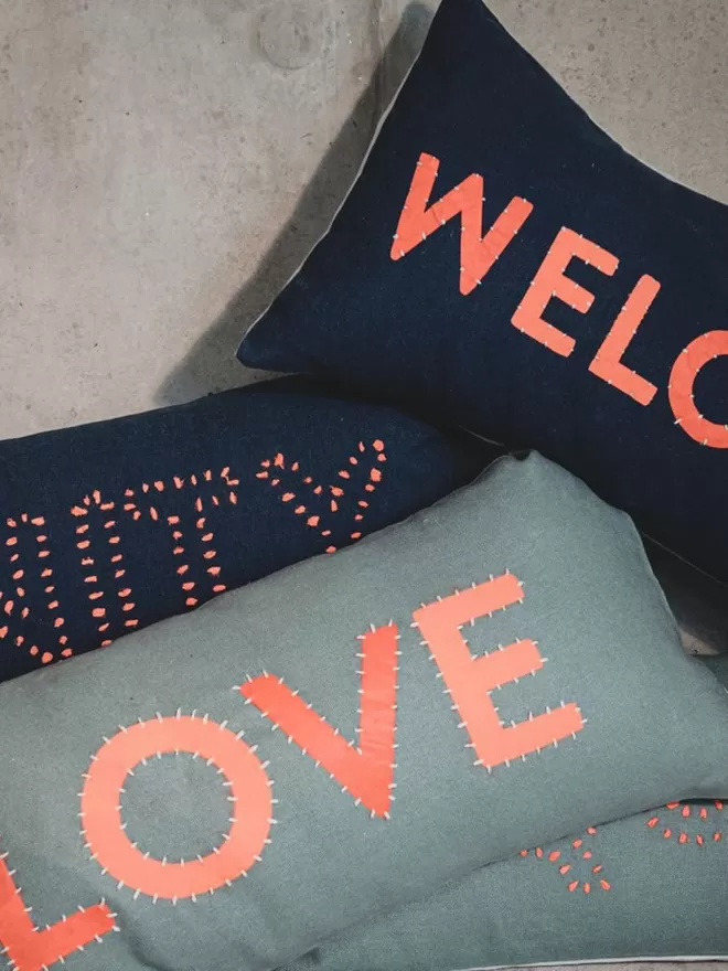 Cushions, hand made, unity, Equal, Love, Welcome.