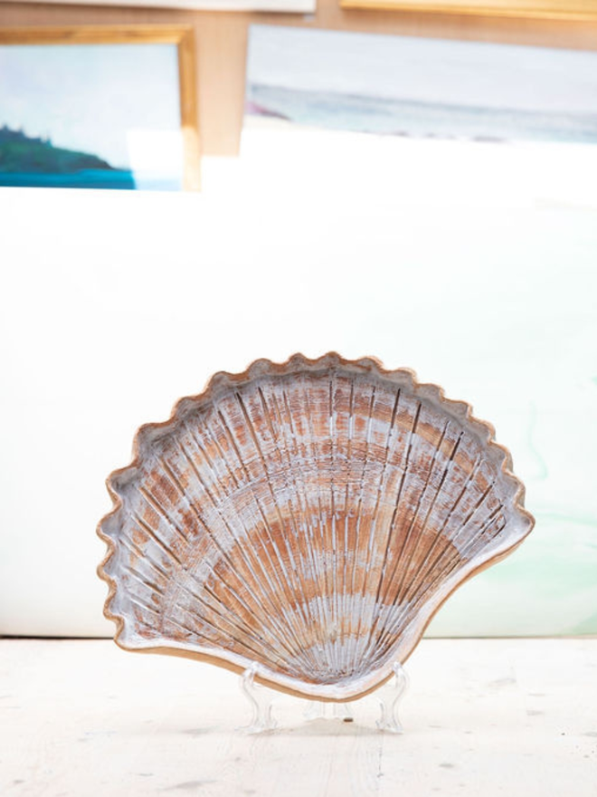 Ceramic shell plate