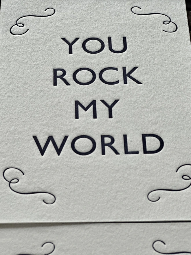 You rock my world postcard close up