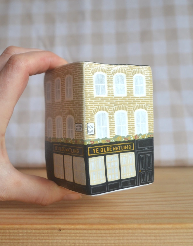 handmade ceramic sculpture in design of a pub