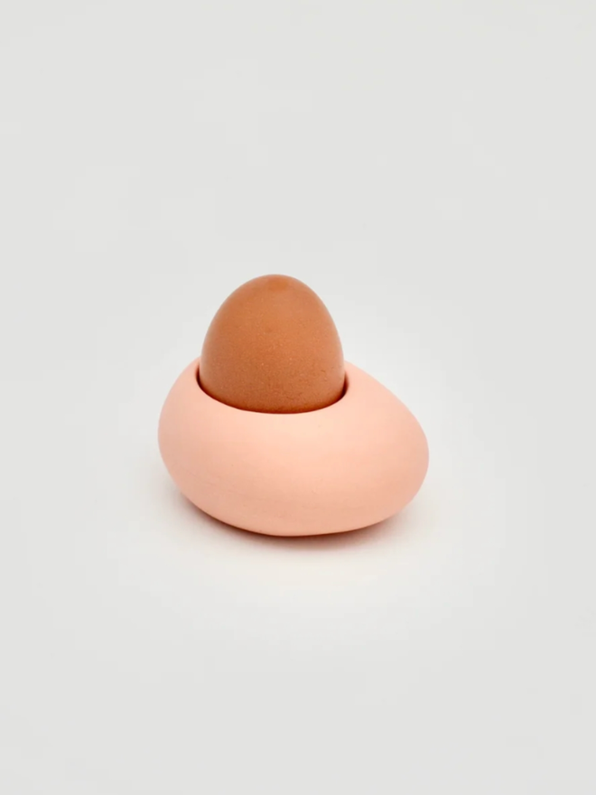 Kelly Egg Cup. A pink egg cup.