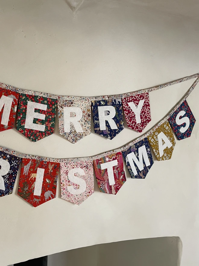 Merry Christmas Bunting made with a mix of Liberty London Christmas Prints