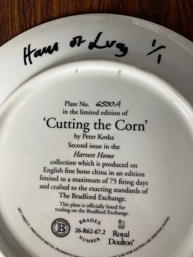 Haus of Lucy signature on back on plate