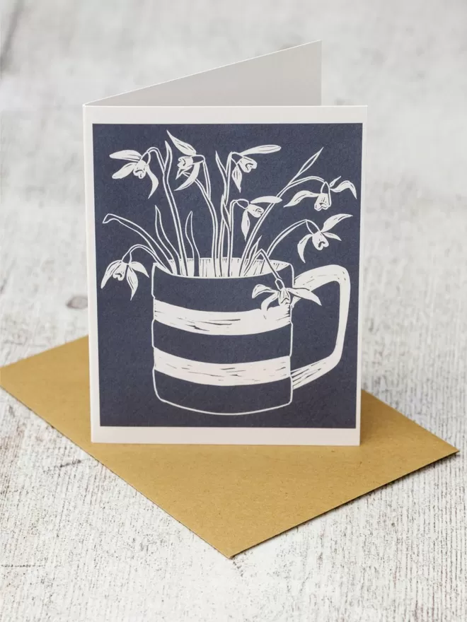 Greeting Card with an image of Snowdrop Flowers in a Cornishware Mug taken from an original lino print