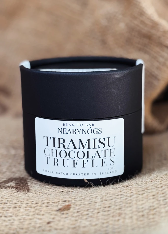 Chocolate Truffles, a tub of chocolate truffles sitting on a sack. 