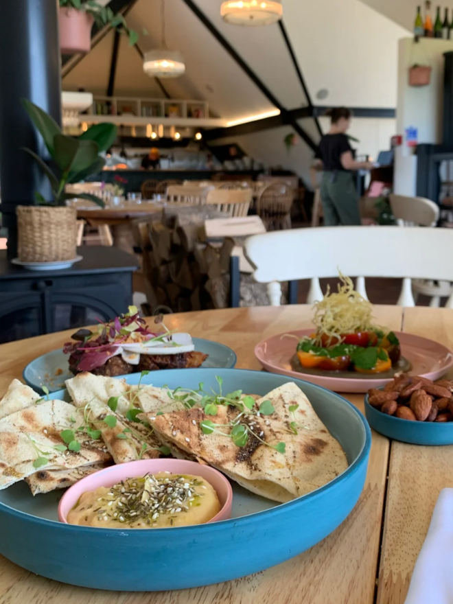 Serving Plate. A green serving plate with food.