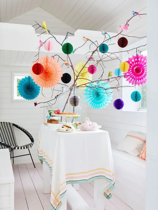 Tissue paper fan and ball decoration styling.